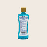 Blue bottle with a gold cap on a beige background