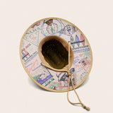 Decorative Panama Jack hat with a colorful pattern on a beige background