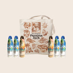 Tote bag and spray bottles with Panama Jack branding on a beige background
