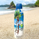 Panama Jack Sunscreen spray bottle with palm tree design on a beach