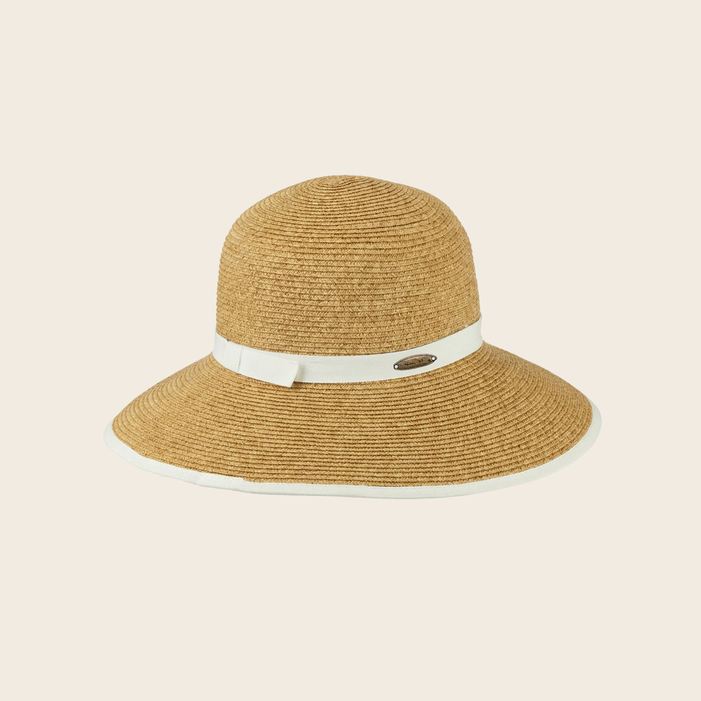 Beige straw Panama Jack hat with a white band on a beige background