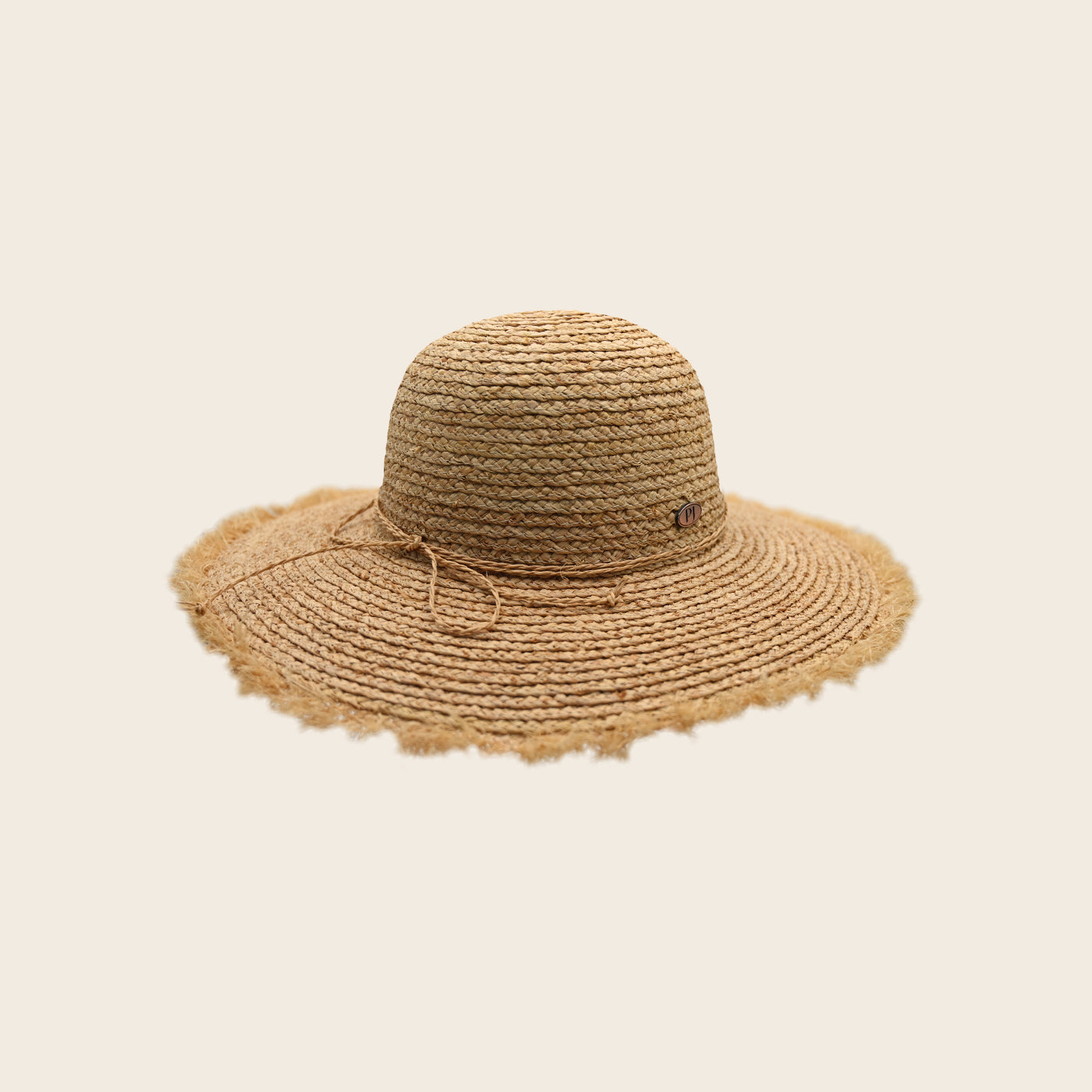 Beige Panama Jack straw hat on a beige background