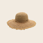 Beige Panama Jack straw hat on a beige background