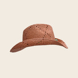 straw Panama Jack hat with decorative elements on a beige background